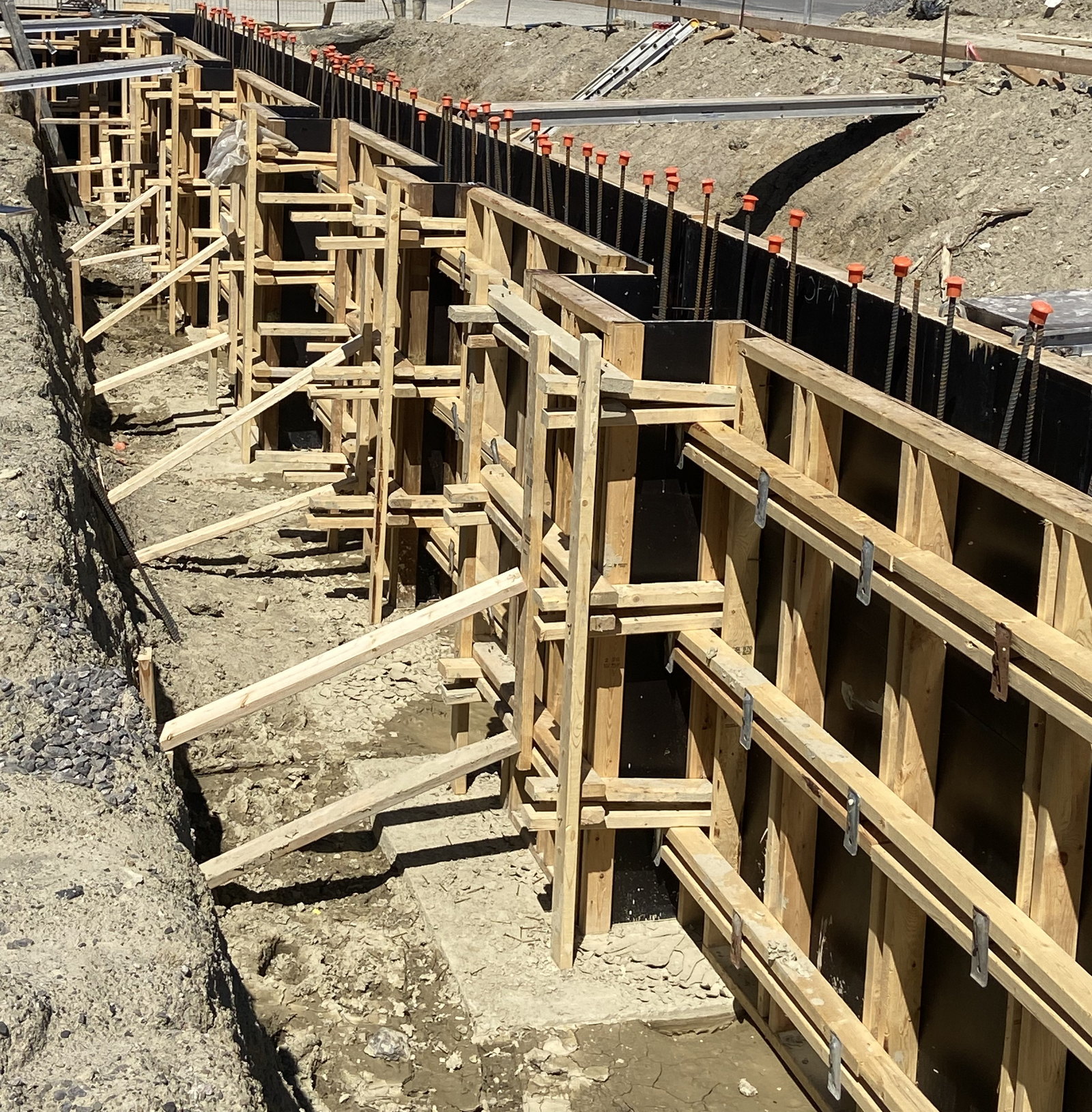 Timber formwork assembled for a concrete foundation wall