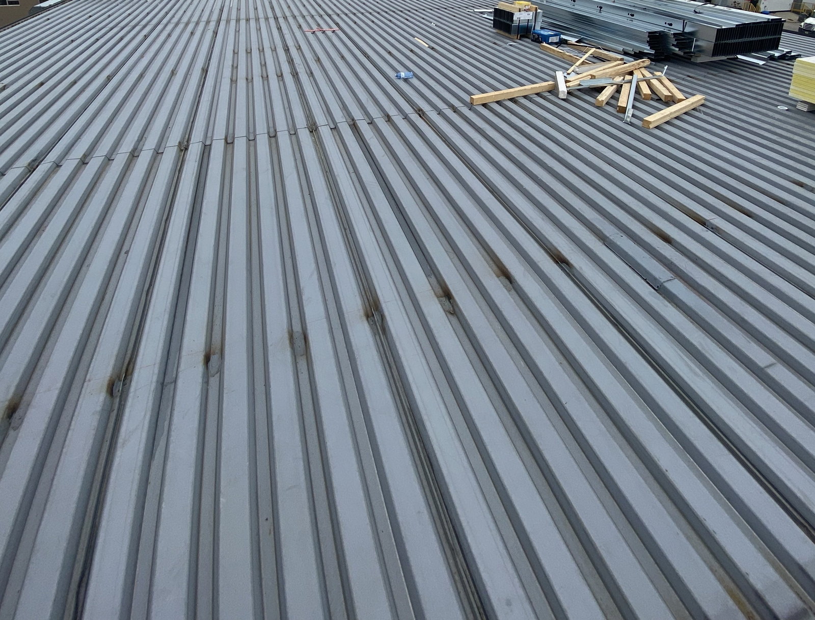 Corrugated steel decking installed across the structure