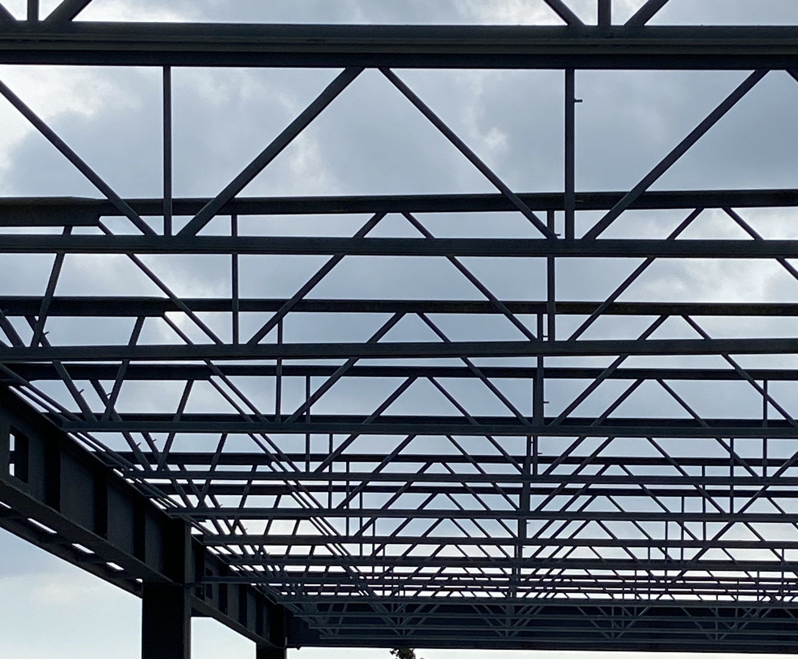 Structural steel framing for a two-storey commercial building addition