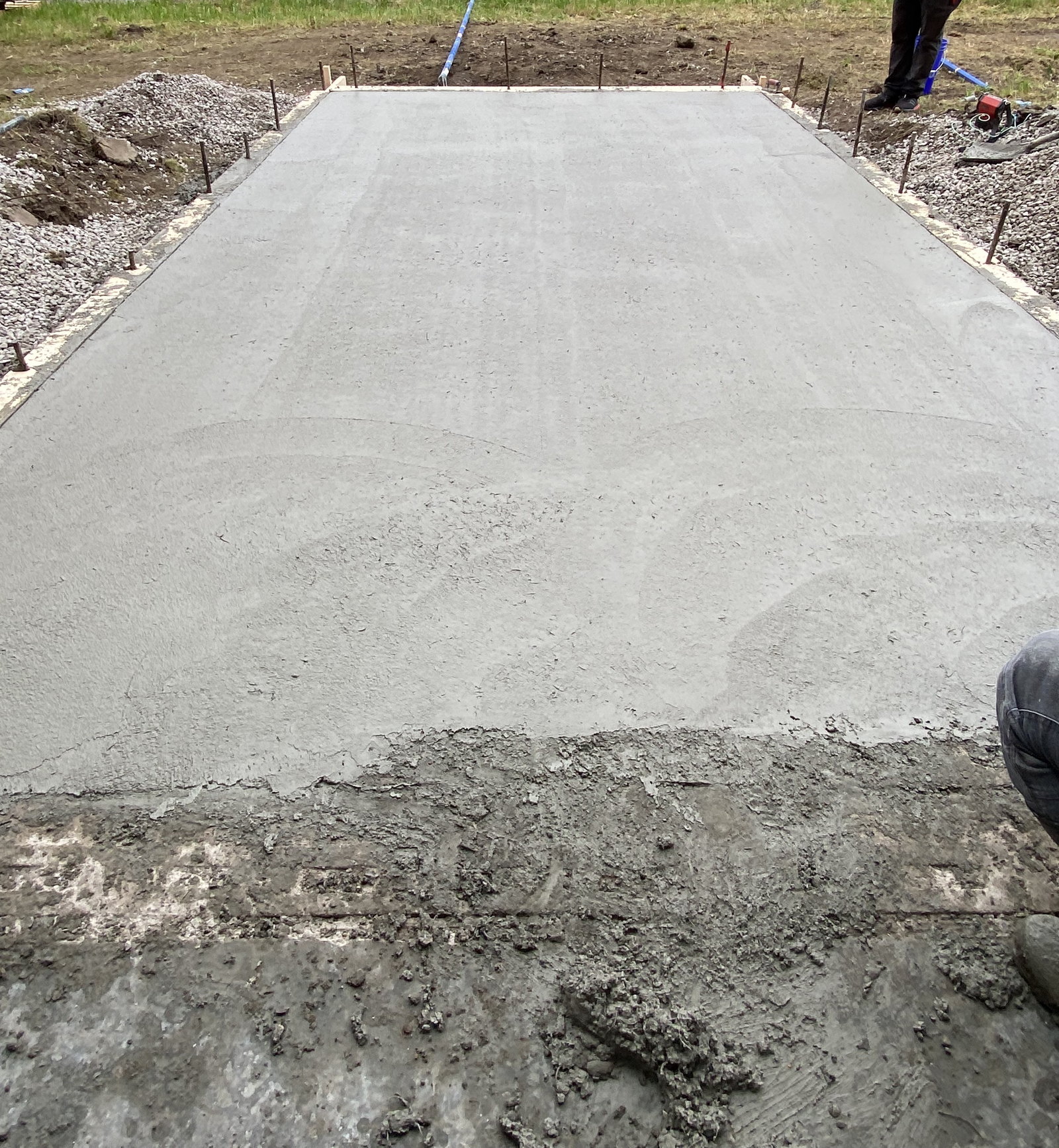 Freshly finished concrete apron surface