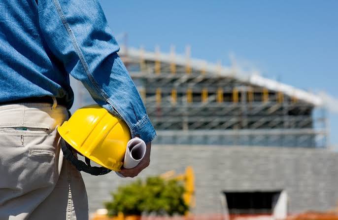 Construction manager overseeing an active building project